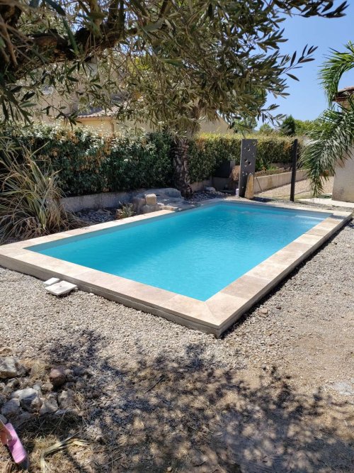 Démolition d'un bassin lagon et pose d'une piscine coque 6 × 3 m à Maraussan